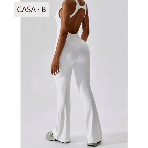 5⭐️CASA B💫| ARIA Flared Essential Open Back Active White Gym Jumpsuit - Picture 6 of 8